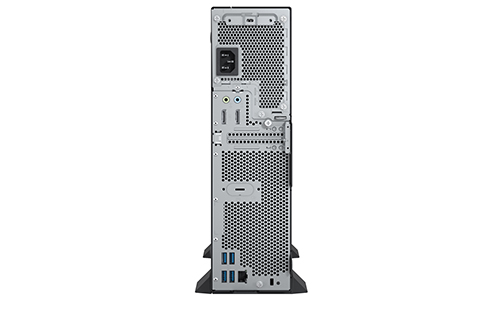 Tylny panel komputera stacjonarnego Fujitsu z portami USB, audio, gniazdem zasilania i wentylacyjną kratką