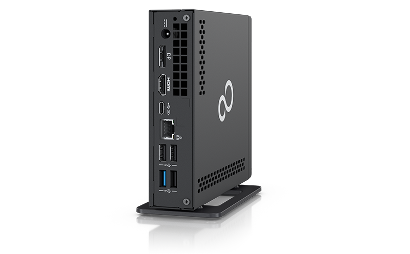 Mały komputer Fujitsu Esprimo G5011 w czarnej obudowie, widok portów z tyłu i z boku.